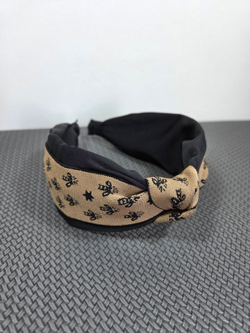 Rudas plaukų lankelis su raštu